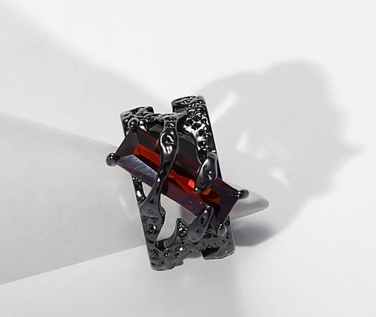 Dark red zircon ring