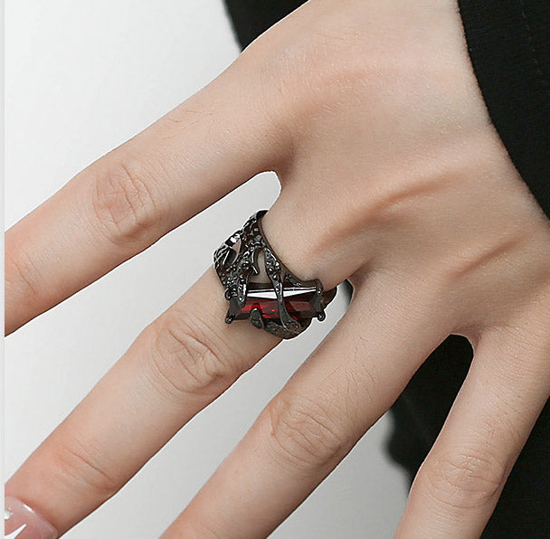 Dark red zircon ring